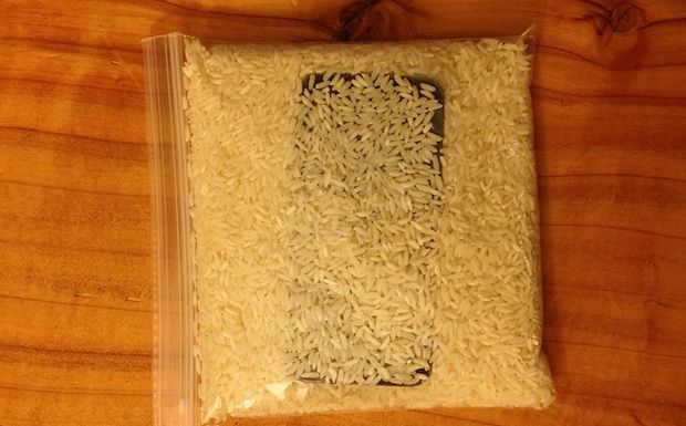 iphone in rice plastic zipper bag