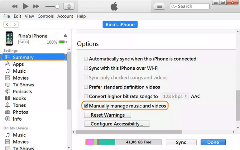 In the Summary, tick the box against Manually manage music and videos